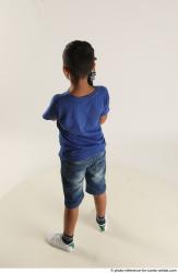 TIMBO STANDING POSE WITH GUN